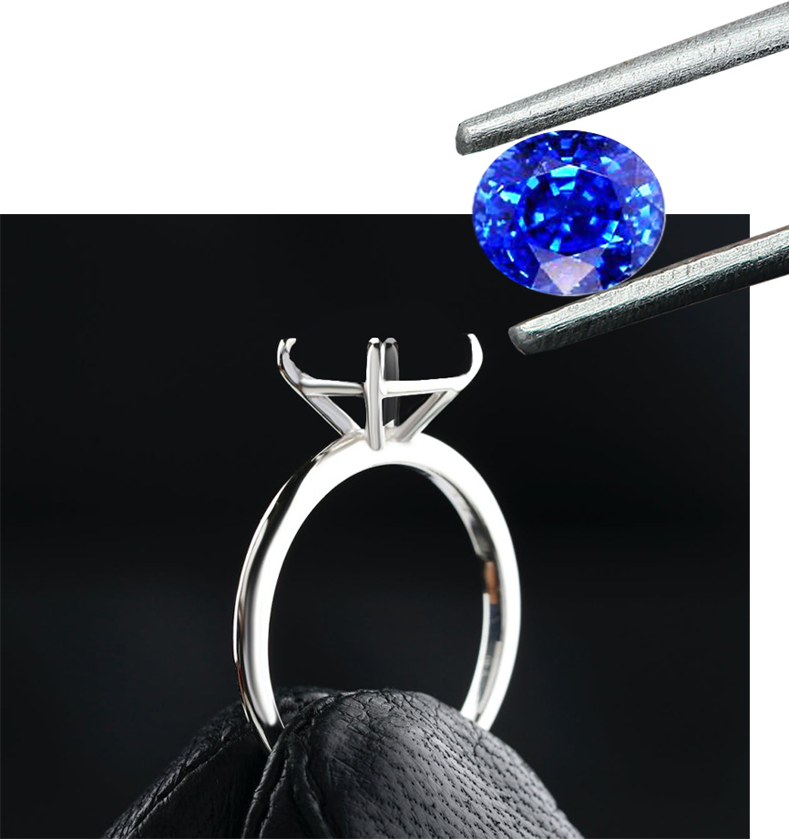 A blue sapphire ring with a diamond in it.