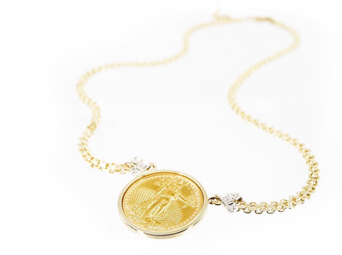 A necklace with a gold coin on it.