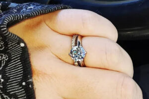 Diamond wedding ring that appears too snug on a finger