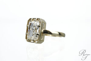 Rick, Blake, and Chris Terry standing together at Rick Terry Jewelry Designs, representing generations of master jewelers in Knoxville.