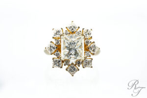 A close-up of a sparkling diamond Jewelry for Christmas gift, set in a unique band and displayed on a jeweler's stand.