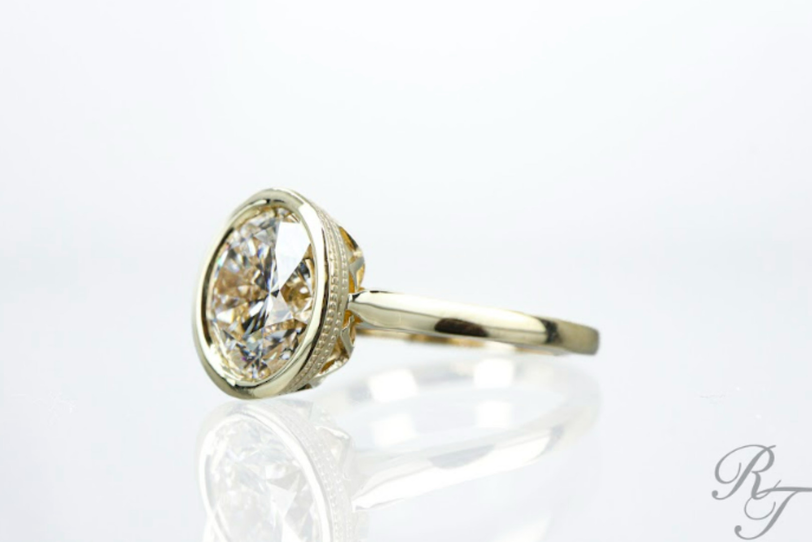Old family ring redesigned into a modern gold diamond engagement ring