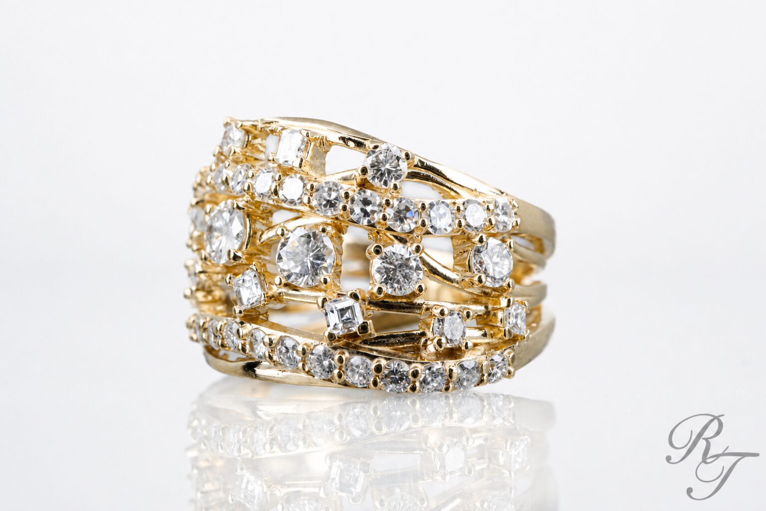 Custom yellow gold multi-row diamond statement ring crafted at Rick Terry Jewelry in Knoxville Tennessee