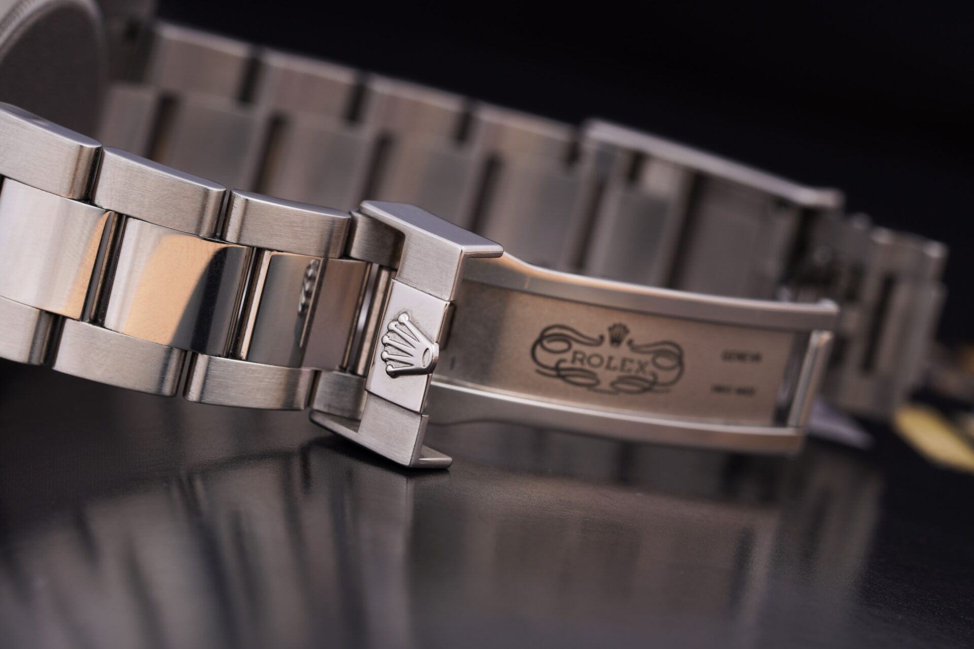 Close-up of a stainless steel Rolex Oyster bracelet clasp, one of the watch brands appraised at Rick Terry Jewelry in Knoxville