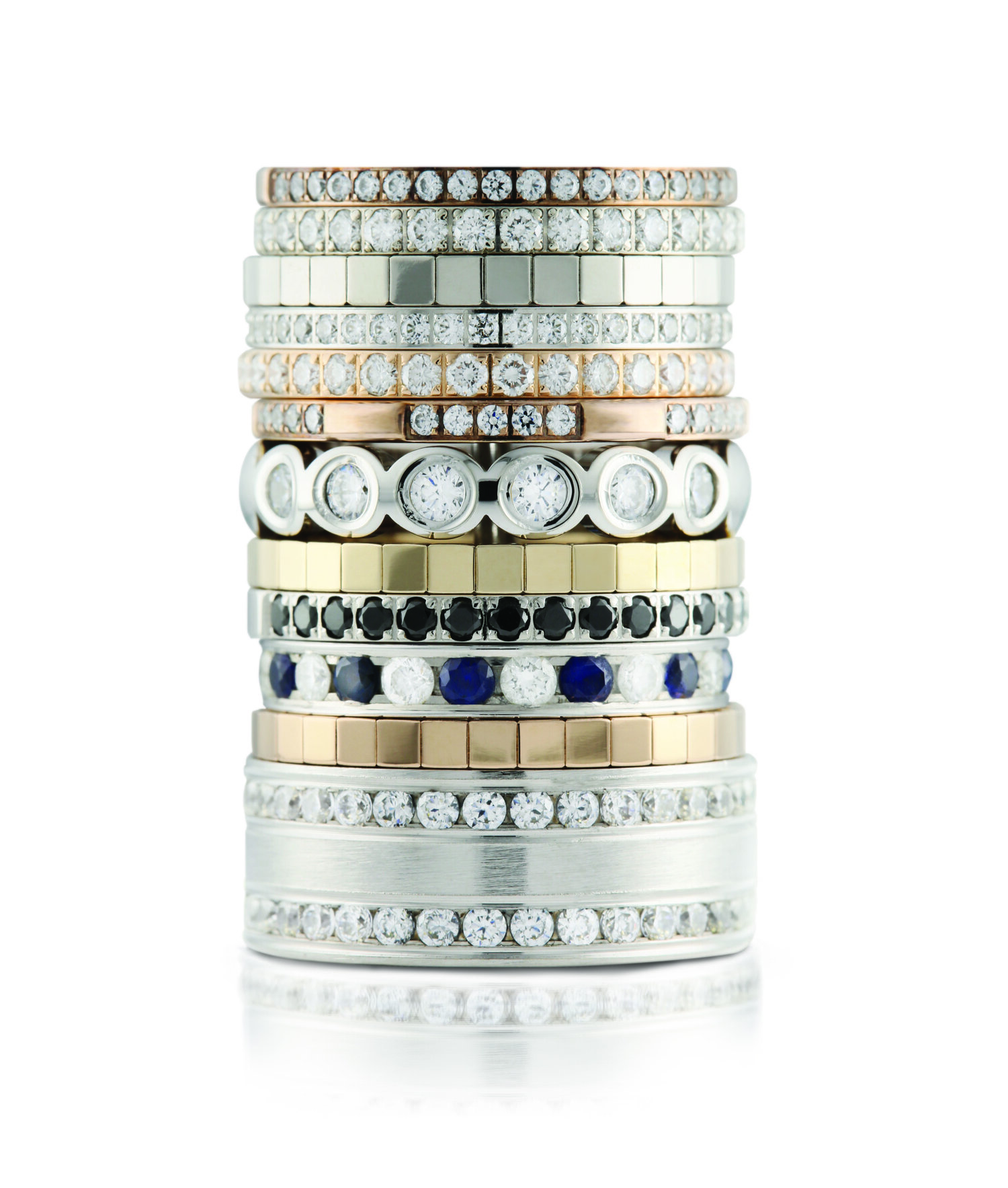 Stacked custom wedding bands Knoxville in rose gold white gold and yellow gold with diamonds and sapphires